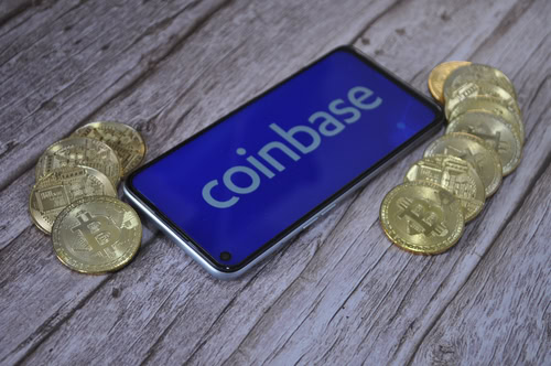 Macro view of gold and silver color shiny coins with Bitcoin symbol