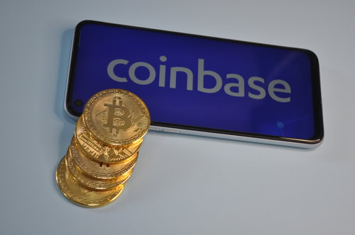 Macro view of gold and silver color shiny coins with Bitcoin symbol