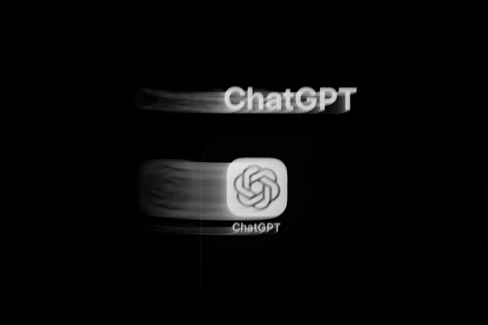 Blurry ChatGPT logo and name repeated twice, one clear and one blurred, on a dark background