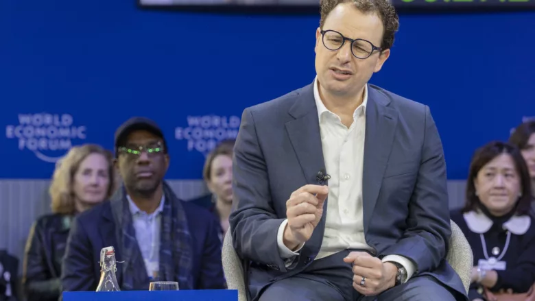 Anthropic CEO Dario Amodei speaking on stage at the World Economic Forum