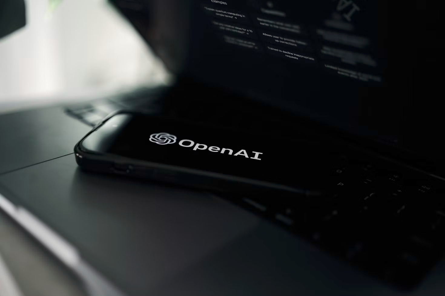 The OpenAI logo displayed on a smartphone screen. Image credit: Unsplash