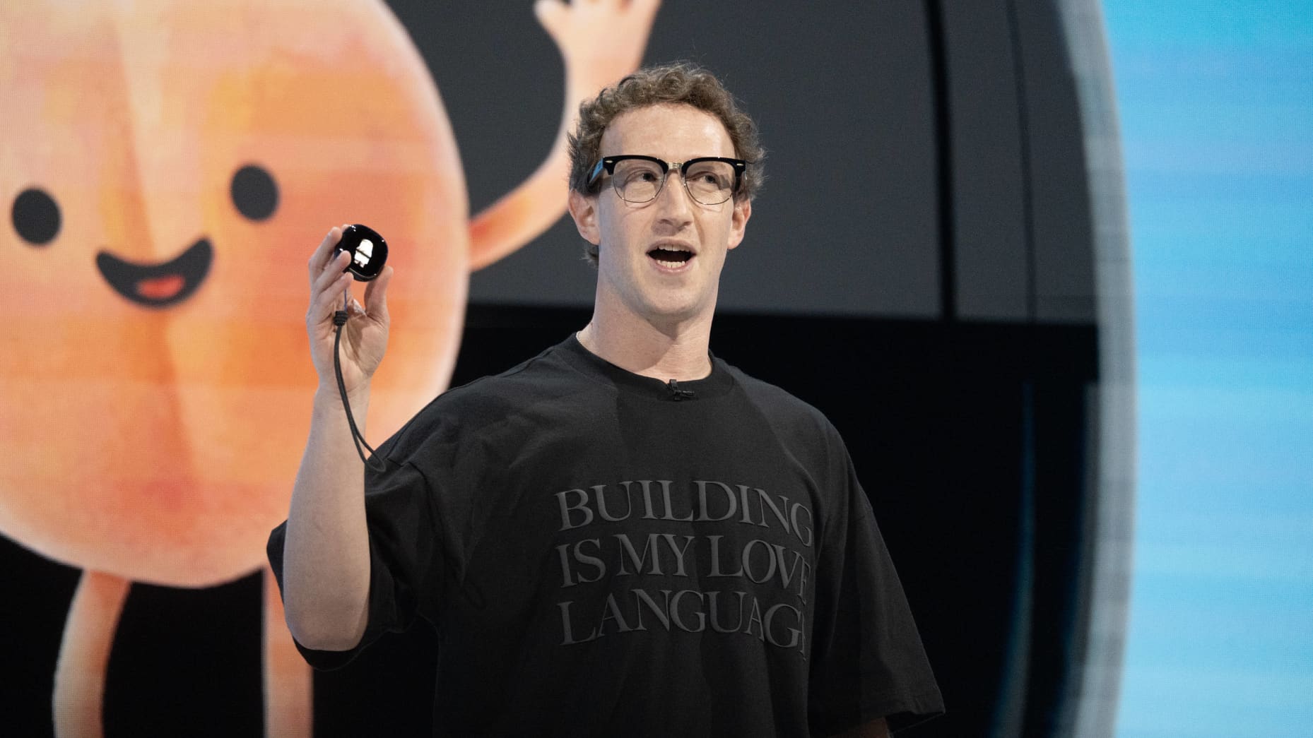 Mark Zuckerberg, chief executive officer of Meta Platforms Inc., reveals the Muse Charm device during the Meta Connect event in Menlo Park, California, US, on Wednesday, Sept. 23, 2026. The event showcases Meta's latest breakthroughs in AI technologies, AI glasses and VR. Photographer: Minh Connors/Bloomberg via Getty Images
