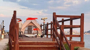 Family Sparks Outrage for Pitching Tent and Fishing at Public Park Observation Deck