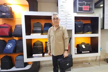 Malaysian Chinese bag-maker Liew Bin now sees value in protectionist measures as low-cost competition from China threatens Malaysian small and medium-sized enterprises.