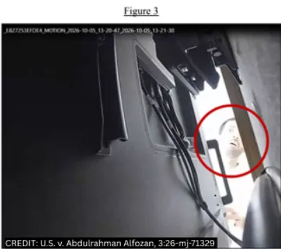 Abdulrahman Alfozan, 35, peeking behind a TV that was bugged in an OpenAI conference room.<span class="copyright">Justice Department</span>