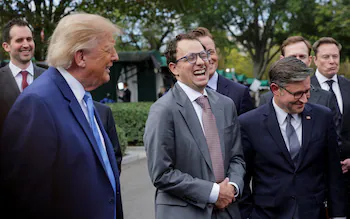 Dario Amodei (centre), pictured at the White House last month, has warned that AI poses risks to humanity