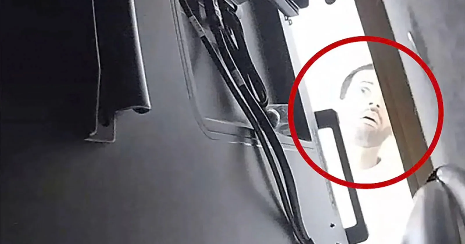 Person inspecting secret recording device between metal object and wood, openai has referred to the investigation.