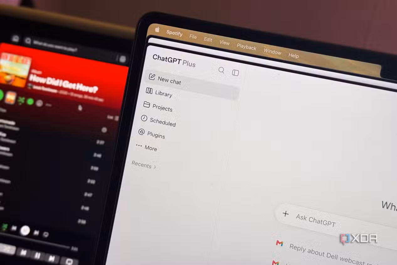 ChatGPT on MacBook with Spotify in the background