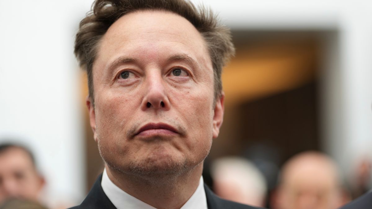 FILE - Elon Musk listens as President Donald Trump speaks during an event at the U.S. Institute of Peace, Oct. 8, 2026, in Washington. (AP Photo/Julia Demaree Nikhinson, File)